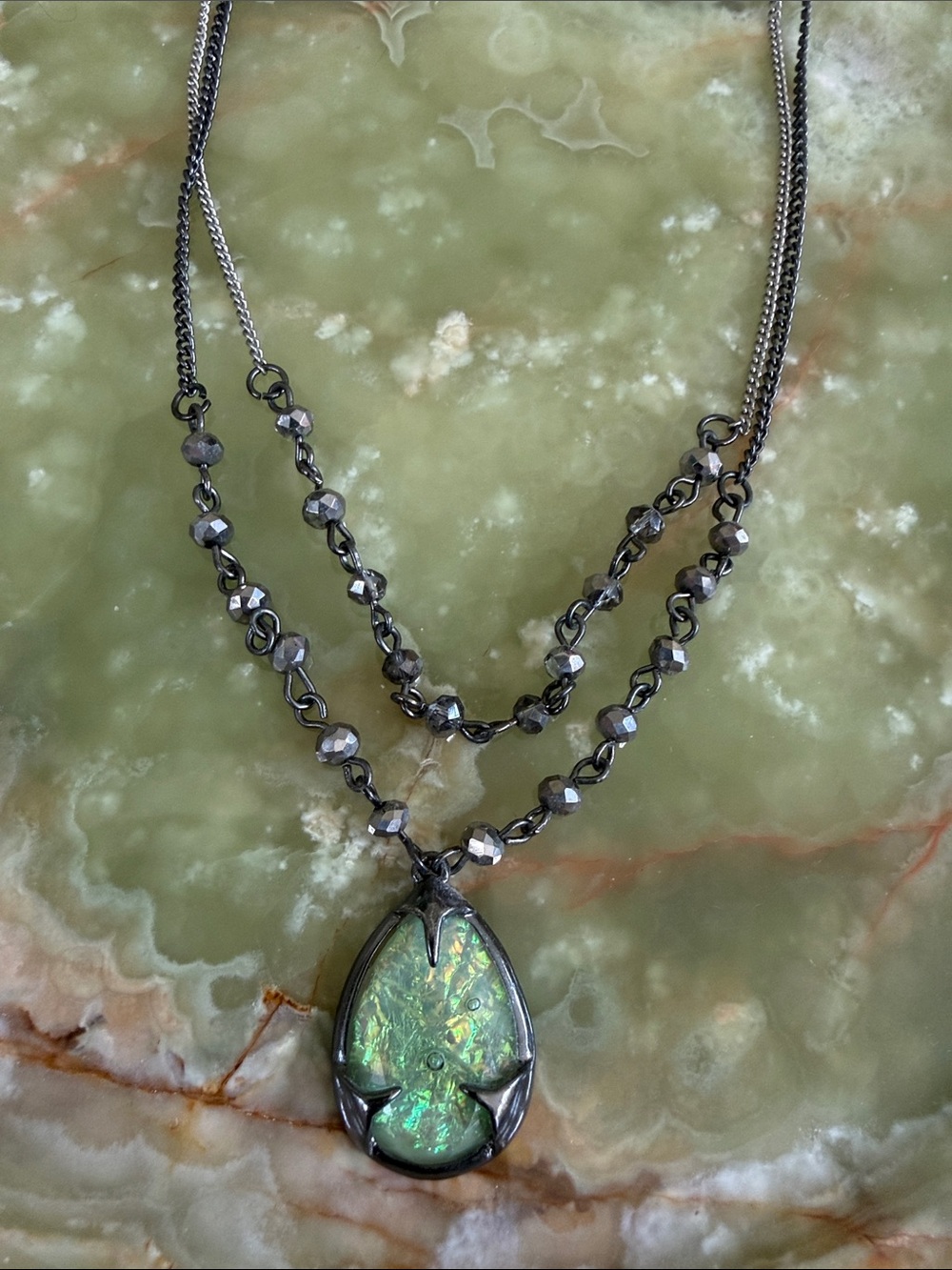 Silver Tone Double Strand Necklace with Green Opalescent Teardrop Pendant